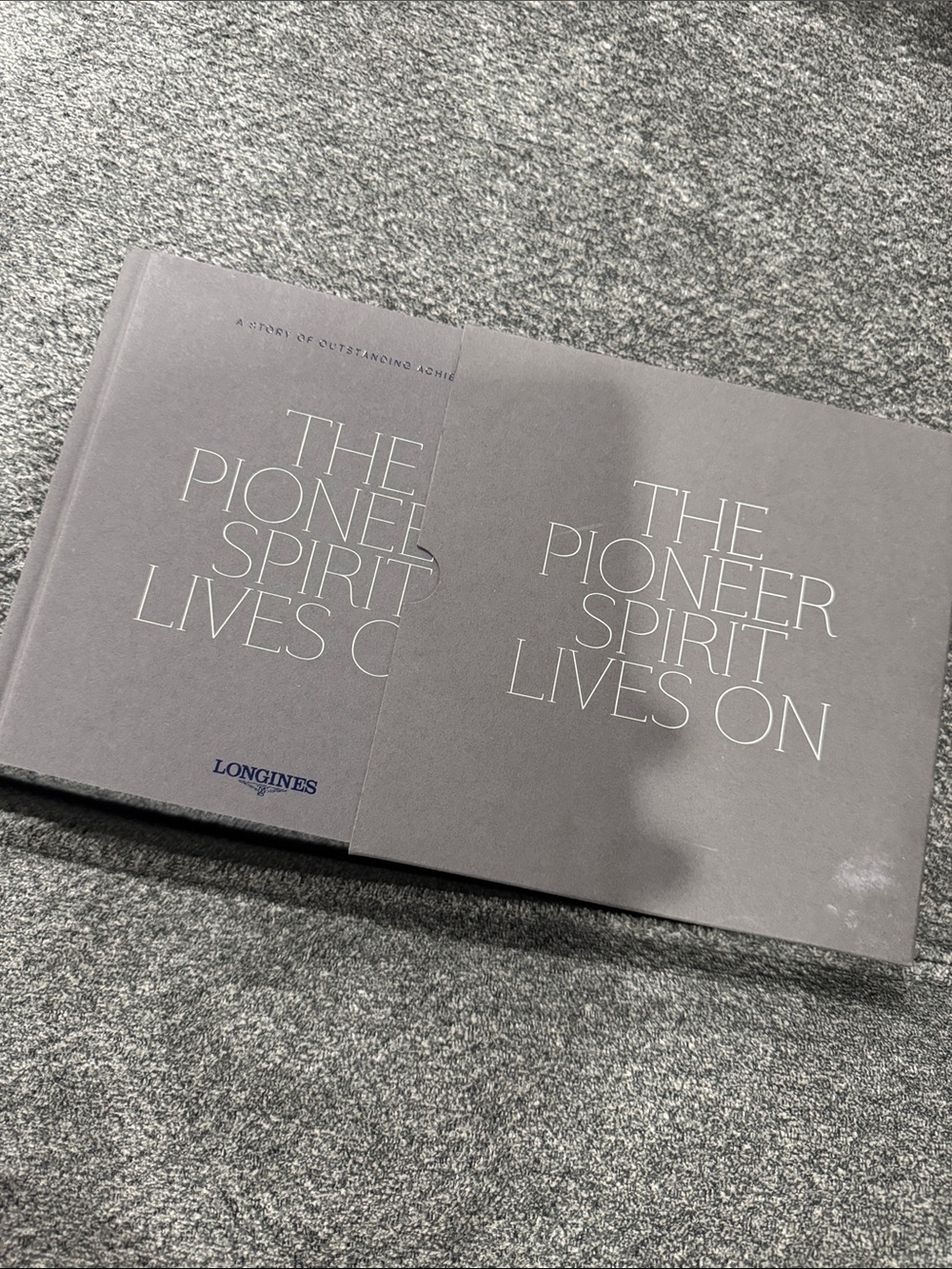 Longines Hardcover Book in Gray with White Title Text